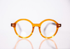Orange round acetate prescription ready eyeglasses with Medium nose bridge, low nose bridge fit and High cheek bones fit
