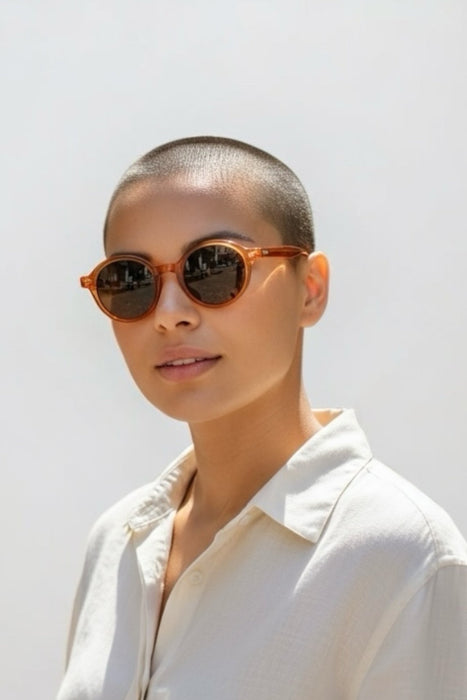 Orange round acetate sunglasses with Medium nose bridge bridge height fit and High cheek bones fit
